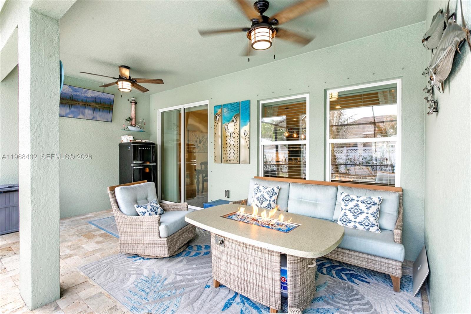 1773 Southwest Palermo Road Port St. Lucie, FL 34987 - Photo 4 of 50 Relax in the evening on your private patio/pool area.