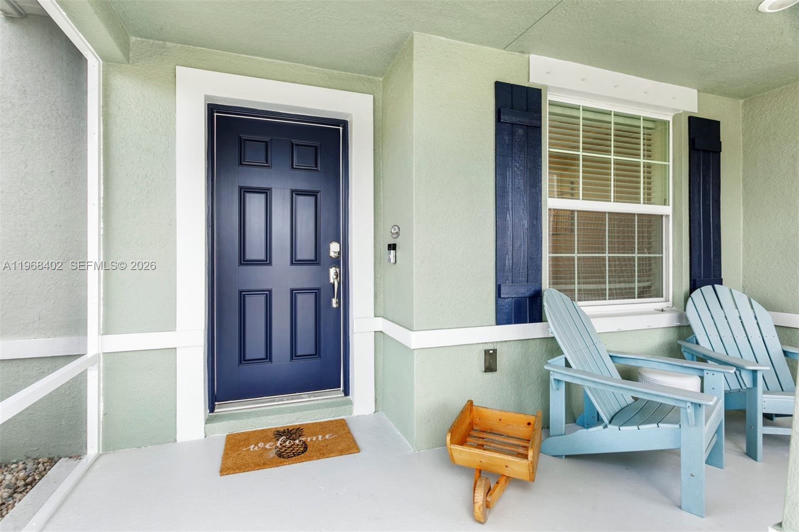 1773 Southwest Palermo Road Port St. Lucie, FL 34987 - Photo 7 of 50 Lovely screened front porch!