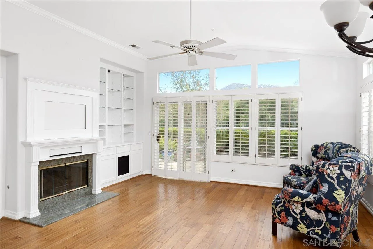 2314 Fallbrook Place Escondido, CA 92027 - Photo 14 of 30 a view of a livingroom with furniture and a fireplace