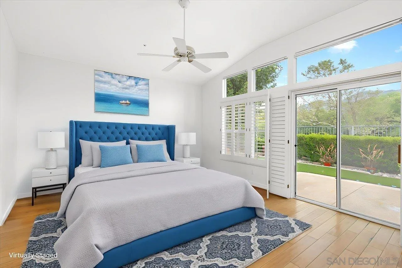 2314 Fallbrook Place Escondido, CA 92027 - Photo 19 of 30 a bedroom with a large bed and a window