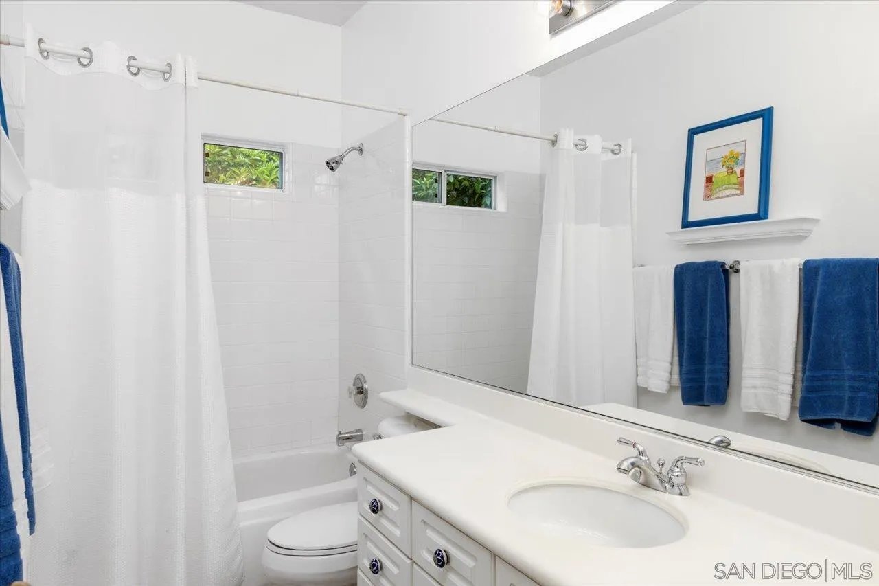 2314 Fallbrook Place Escondido, CA 92027 - Photo 27 of 30 a bathroom with a sink toilet and shower