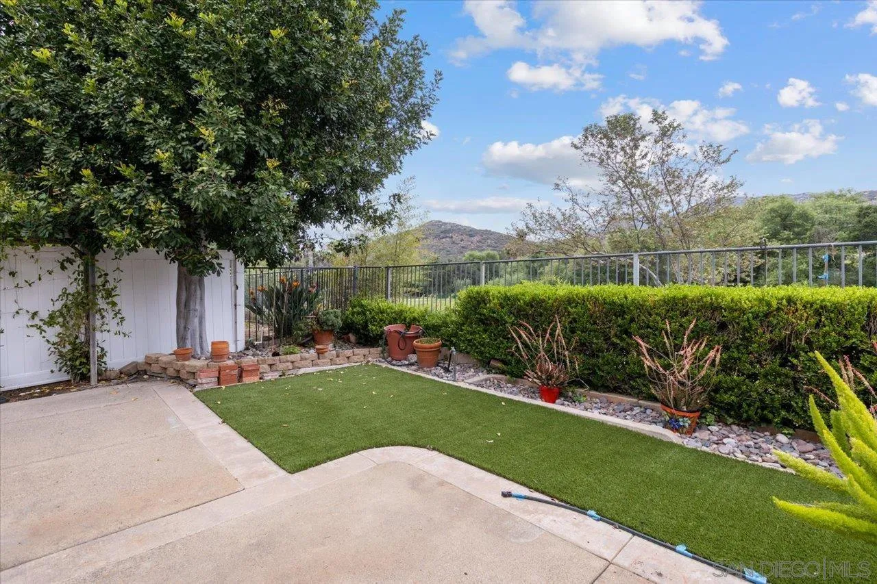 2314 Fallbrook Place Escondido, CA 92027 - Photo 29 of 30 a view of a garden with a fountain