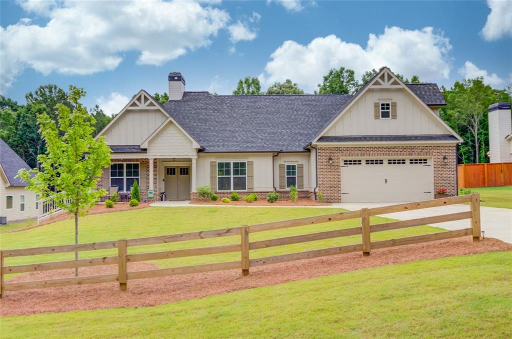 381 Ledbetter Road Winder, GA 30680 - Photo 1 of 1 a front view of a house with a yard