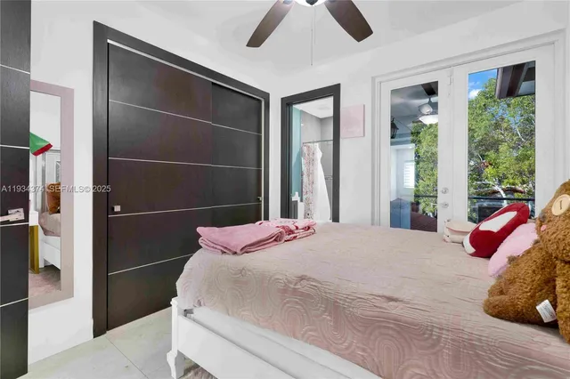 a bedroom with a bed and a shower