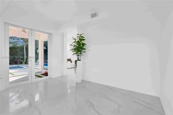 a kitchen with a sink stove and refrigerator