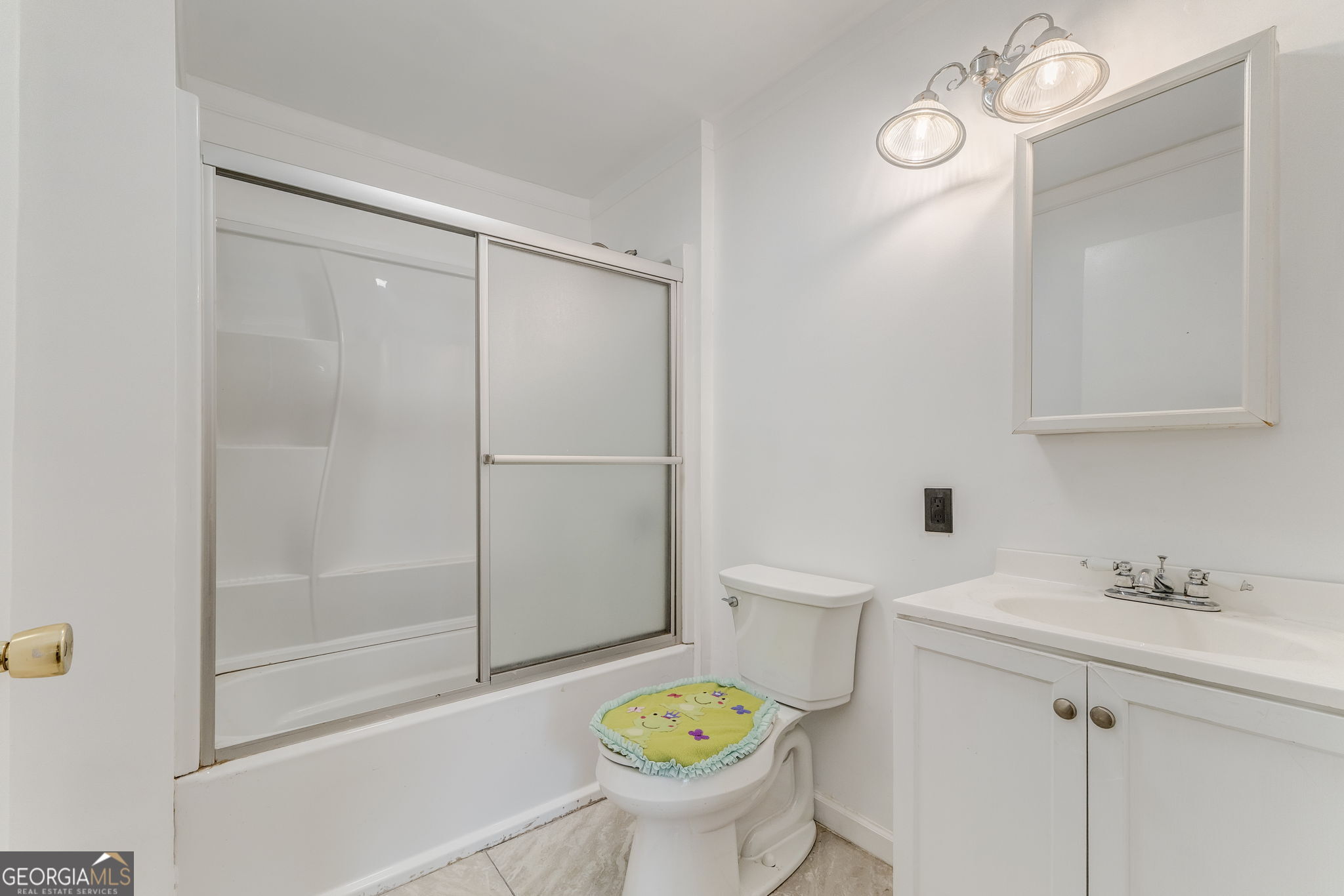 533 Underwood Street Dalton, GA 30721 - Photo 17 of 56 a bathroom with a sink toilet and shower