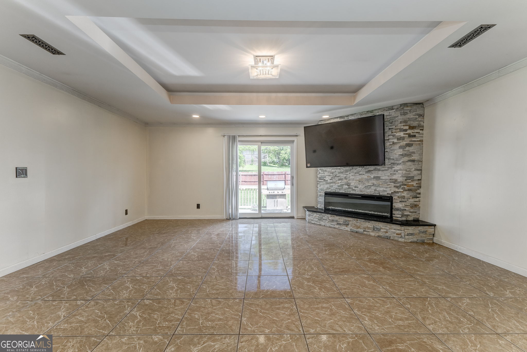 533 Underwood Street Dalton, GA 30721 - Photo 19 of 56 a view of living room with furniture and flat screen tv