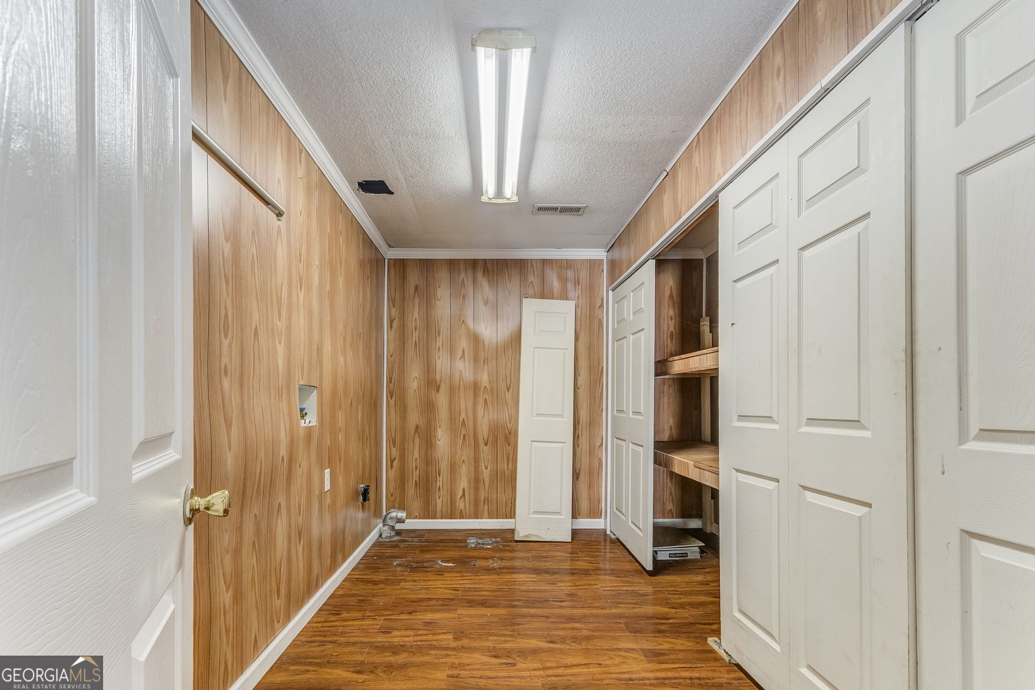 533 Underwood Street Dalton, GA 30721 - Photo 23 of 56 a view of a hallway with wooden floor and staircase