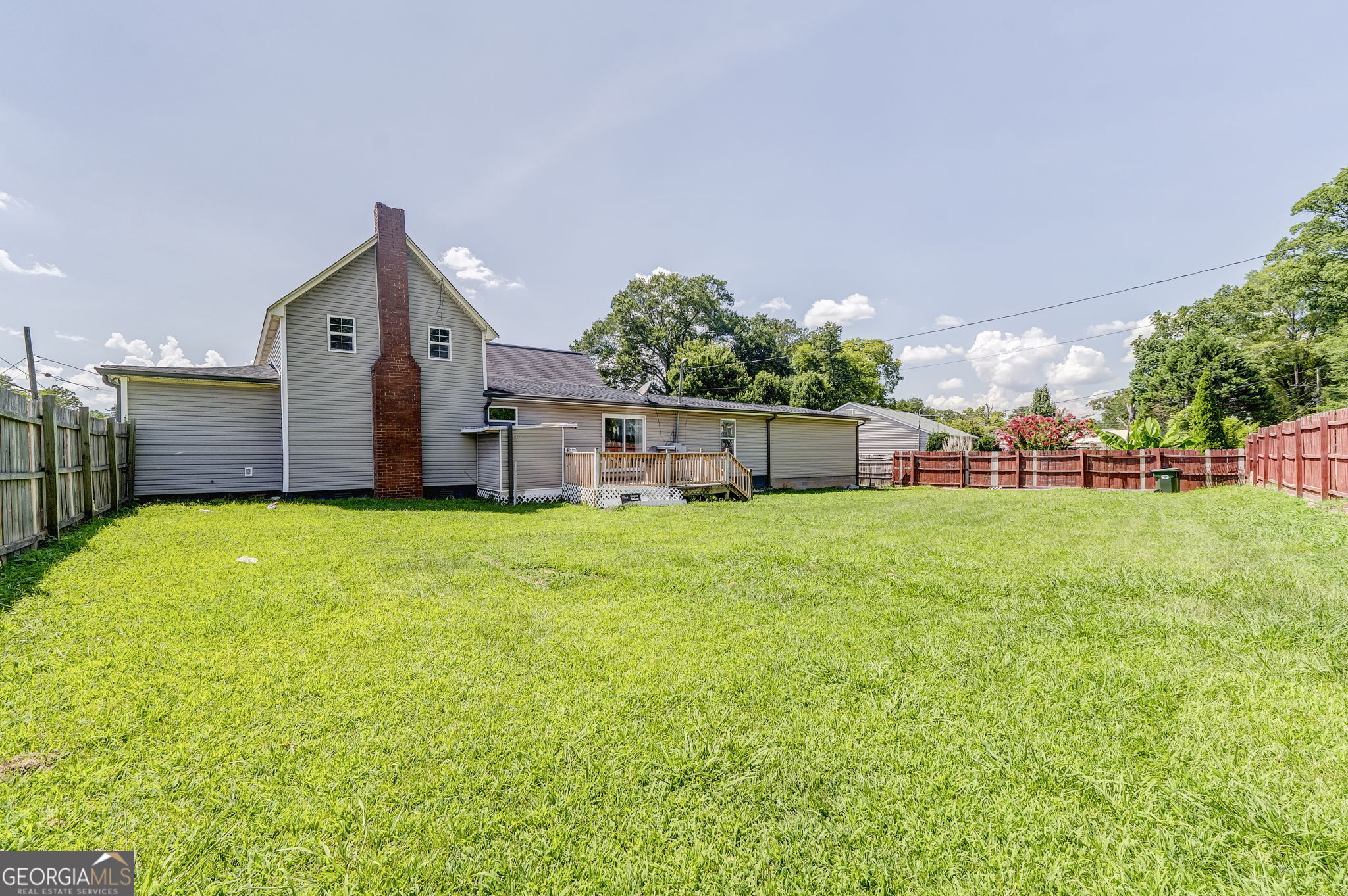 533 Underwood Street Dalton, GA 30721 - Photo 36 of 56 a view of a house with backyard and porch