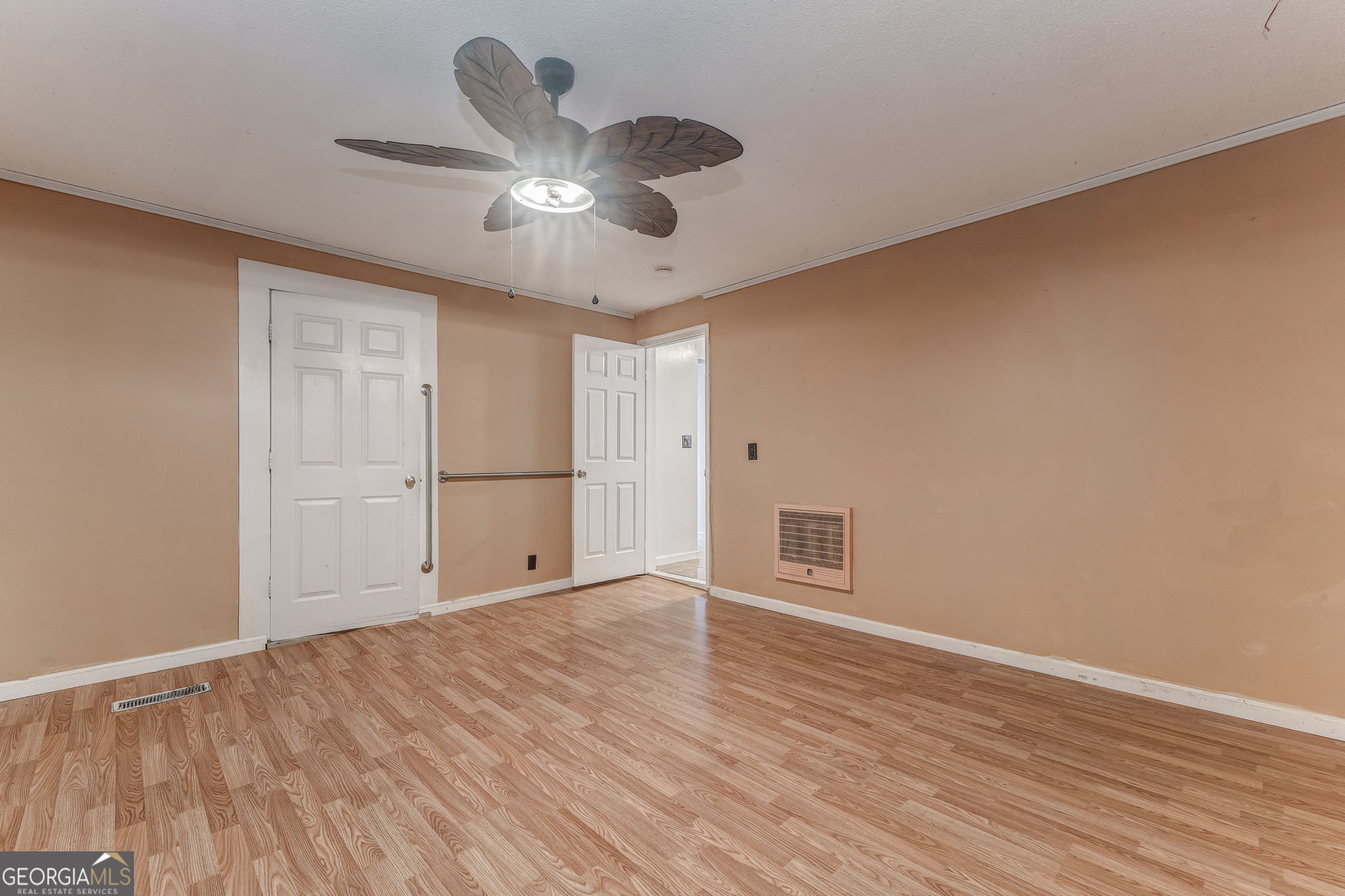 533 Underwood Street Dalton, GA 30721 - Photo 44 of 56 a view of an empty room with wooden floor and a window