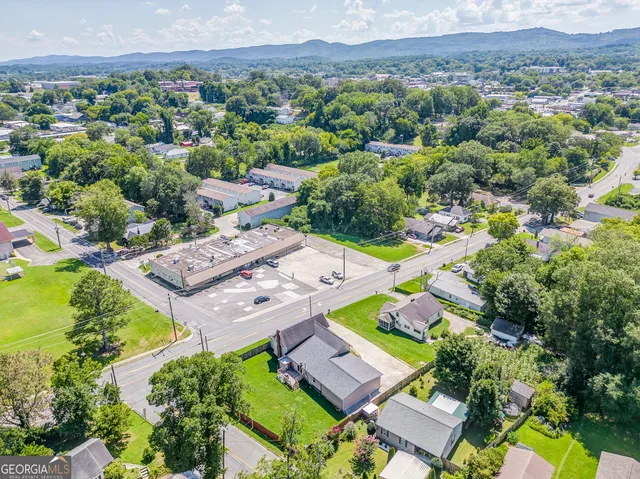 an aerial view of a house with a outdoor space