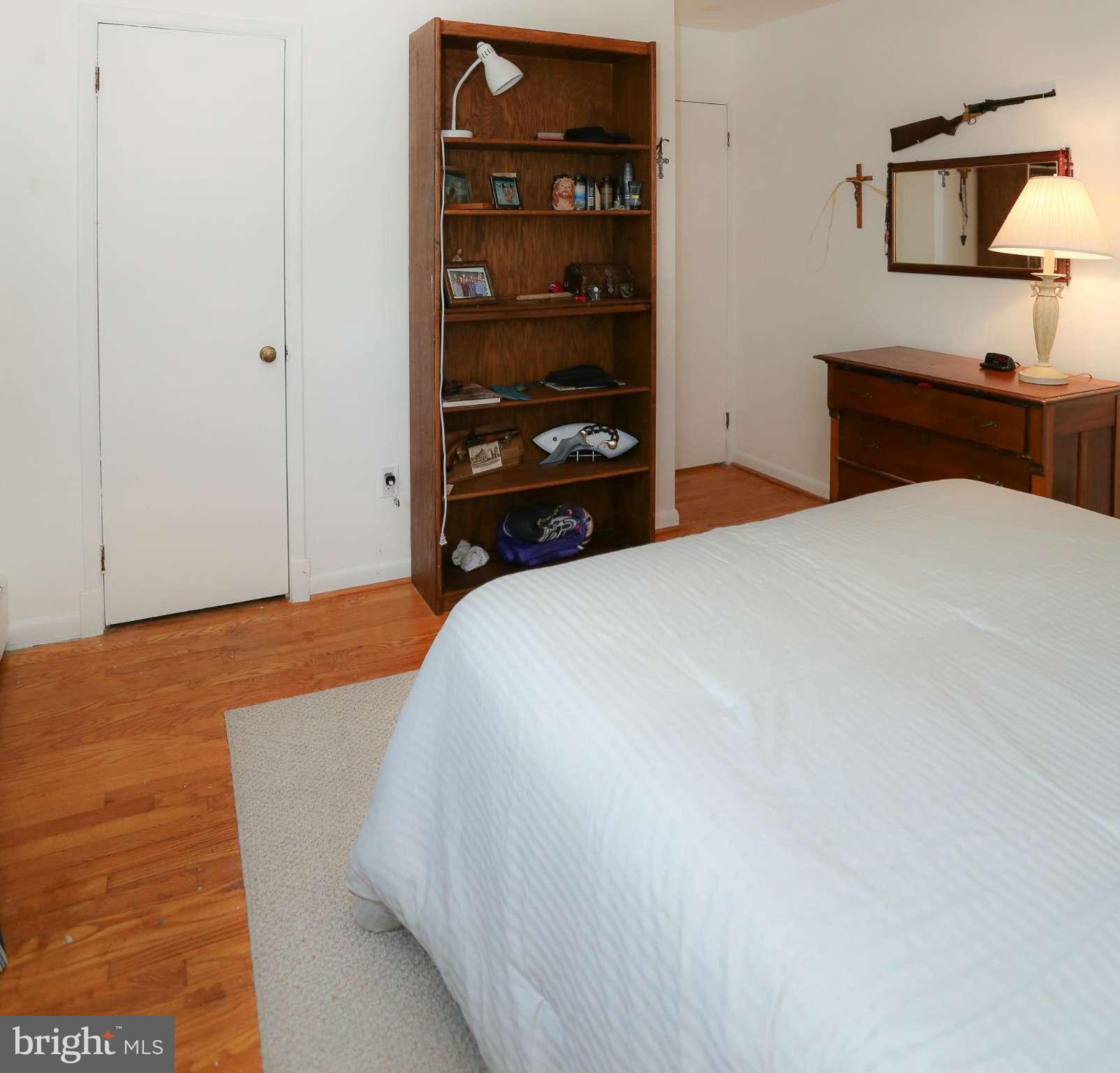 4013 High Point Road Ellicott City, MD 21042 - Photo 16 of 30 a bedroom with a bed and a dresser