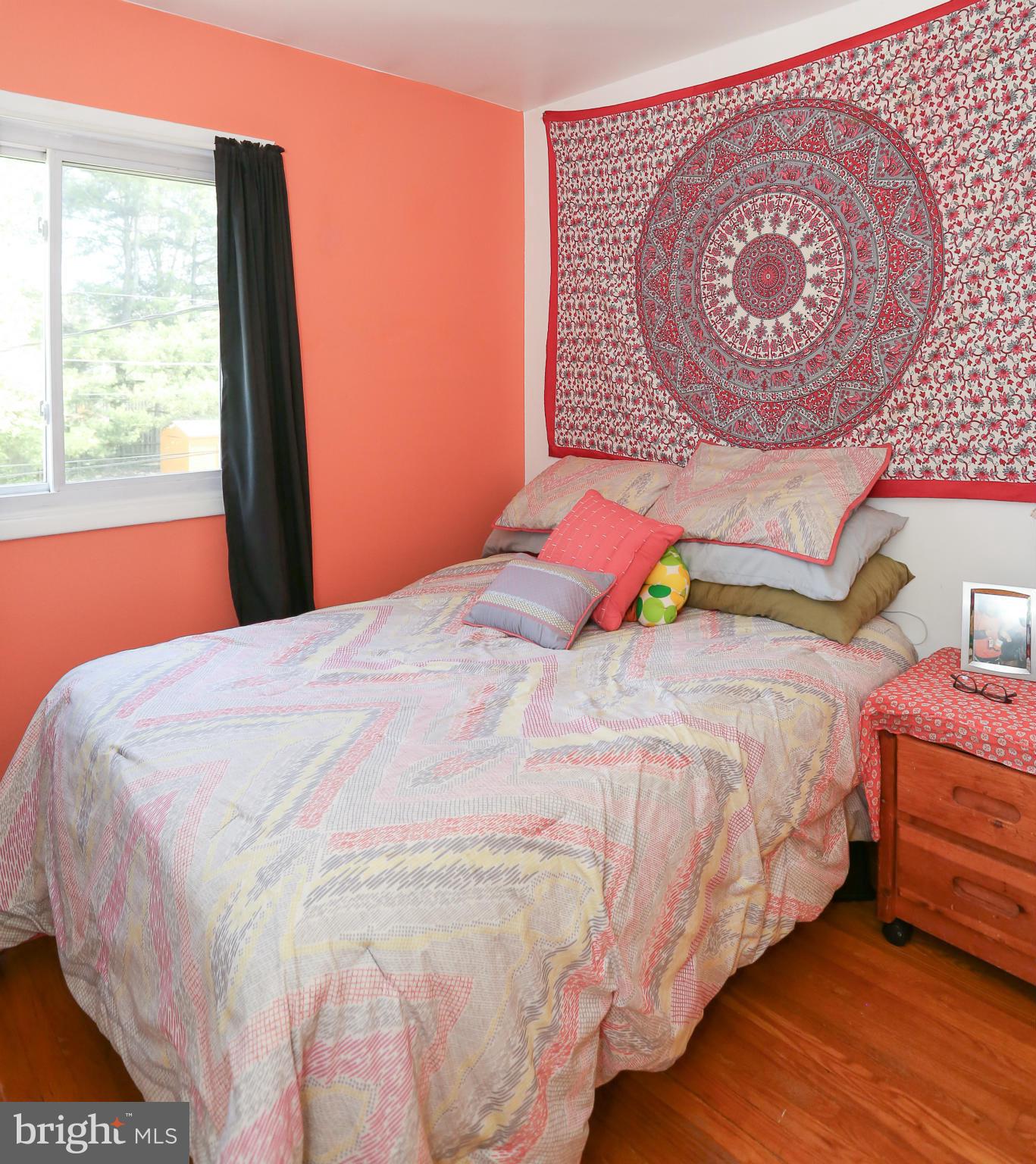 4013 High Point Road Ellicott City, MD 21042 - Photo 17 of 30 a bedroom with a bed and a painting on the wall