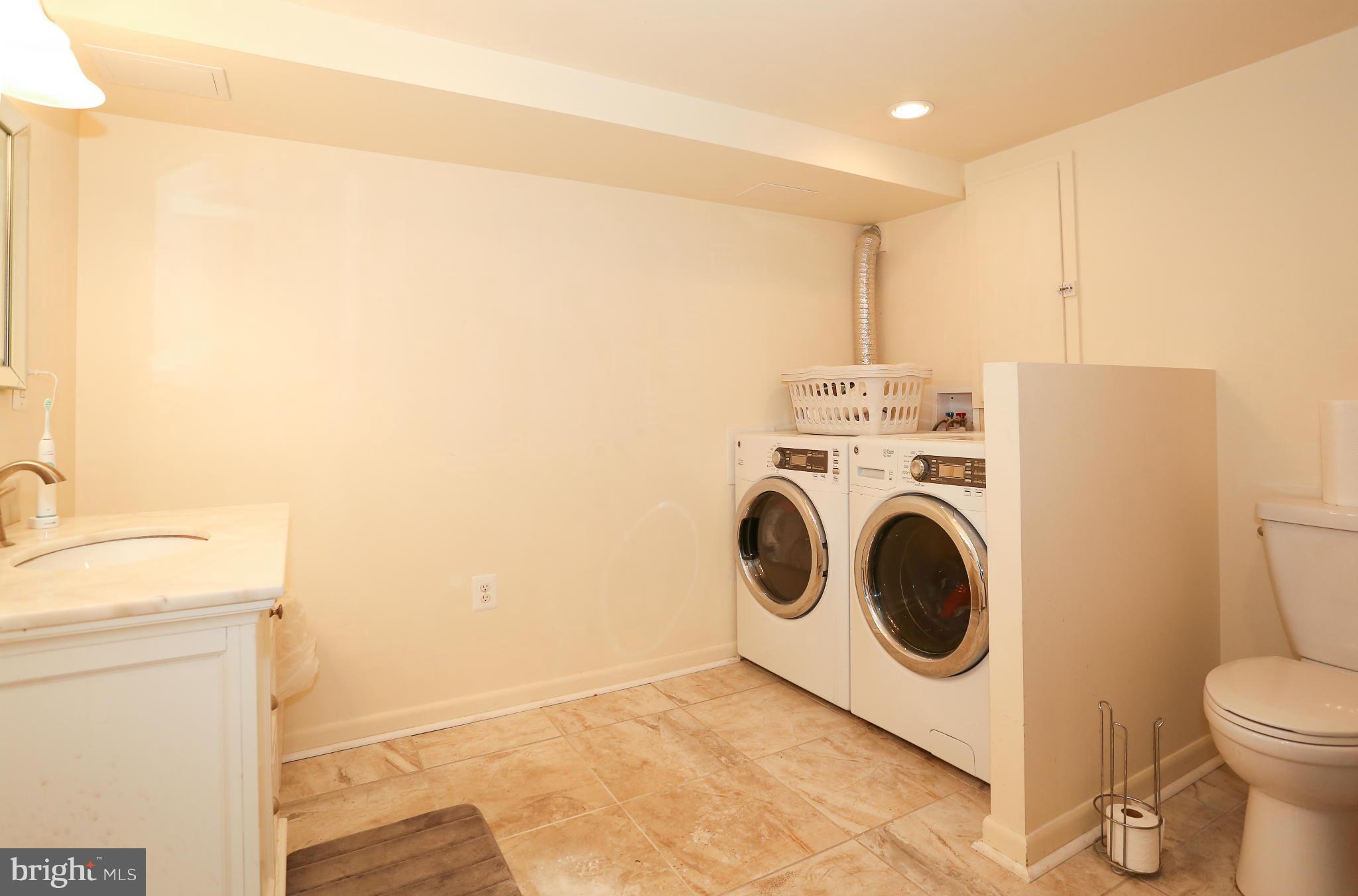 4013 High Point Road Ellicott City, MD 21042 - Photo 23 of 30 a utility room with dryer and washer