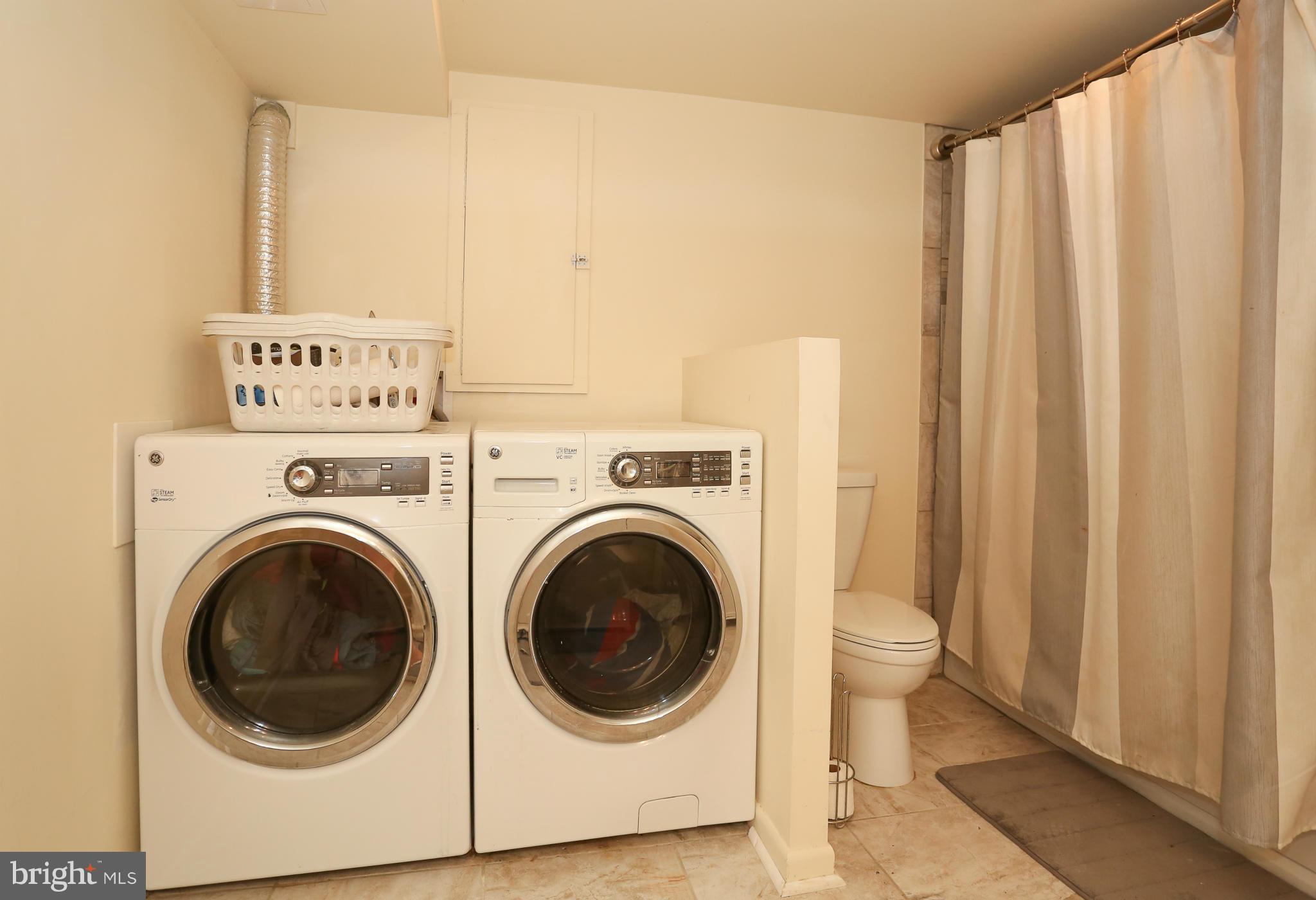 4013 High Point Road Ellicott City, MD 21042 - Photo 24 of 30 a utility room with dryer and washer