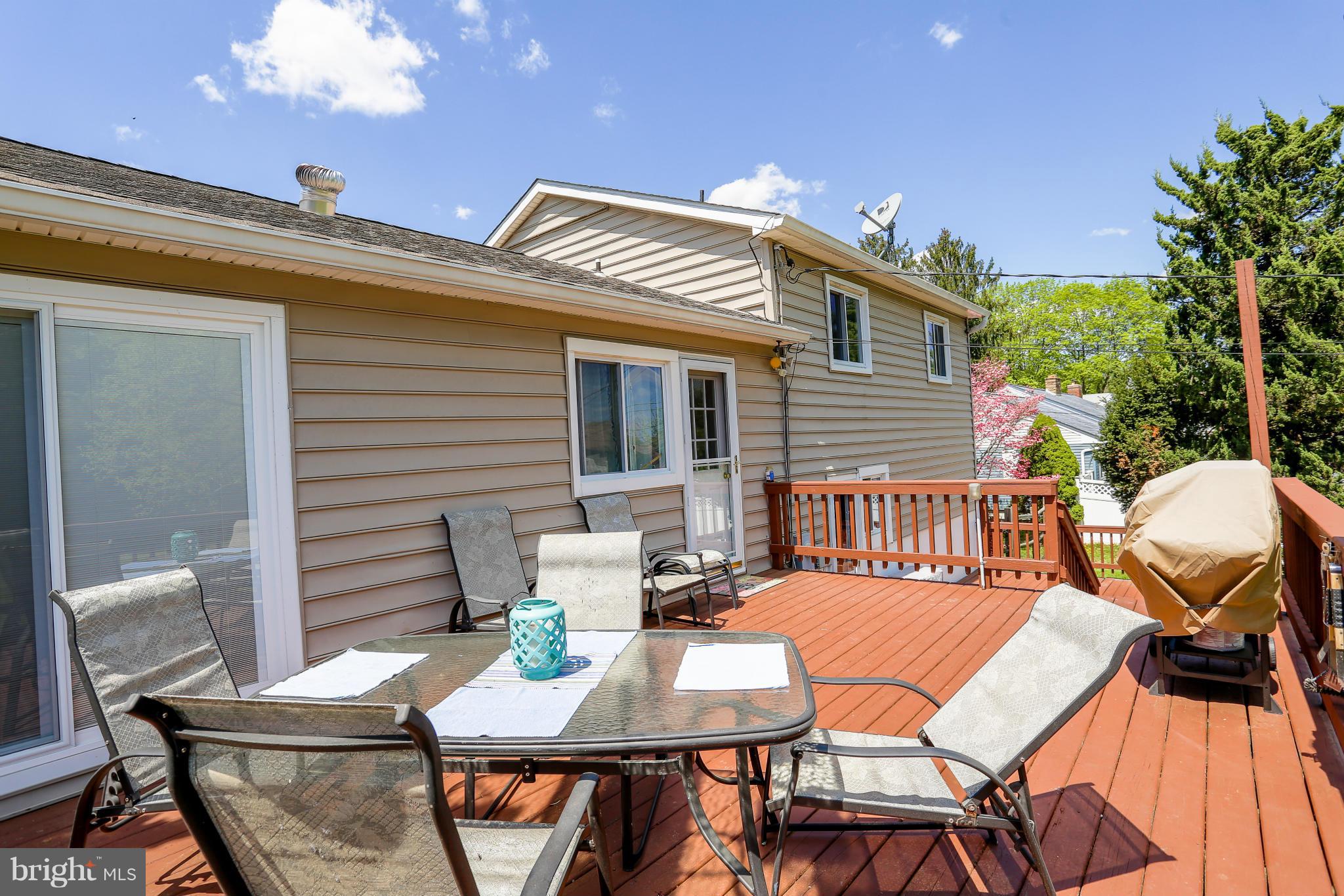 4013 High Point Road Ellicott City, MD 21042 - Photo 26 of 30 a view of a patio with a table and chairs