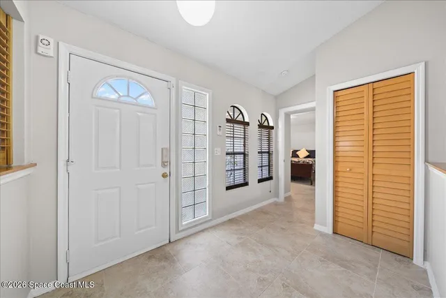 an empty room with windows