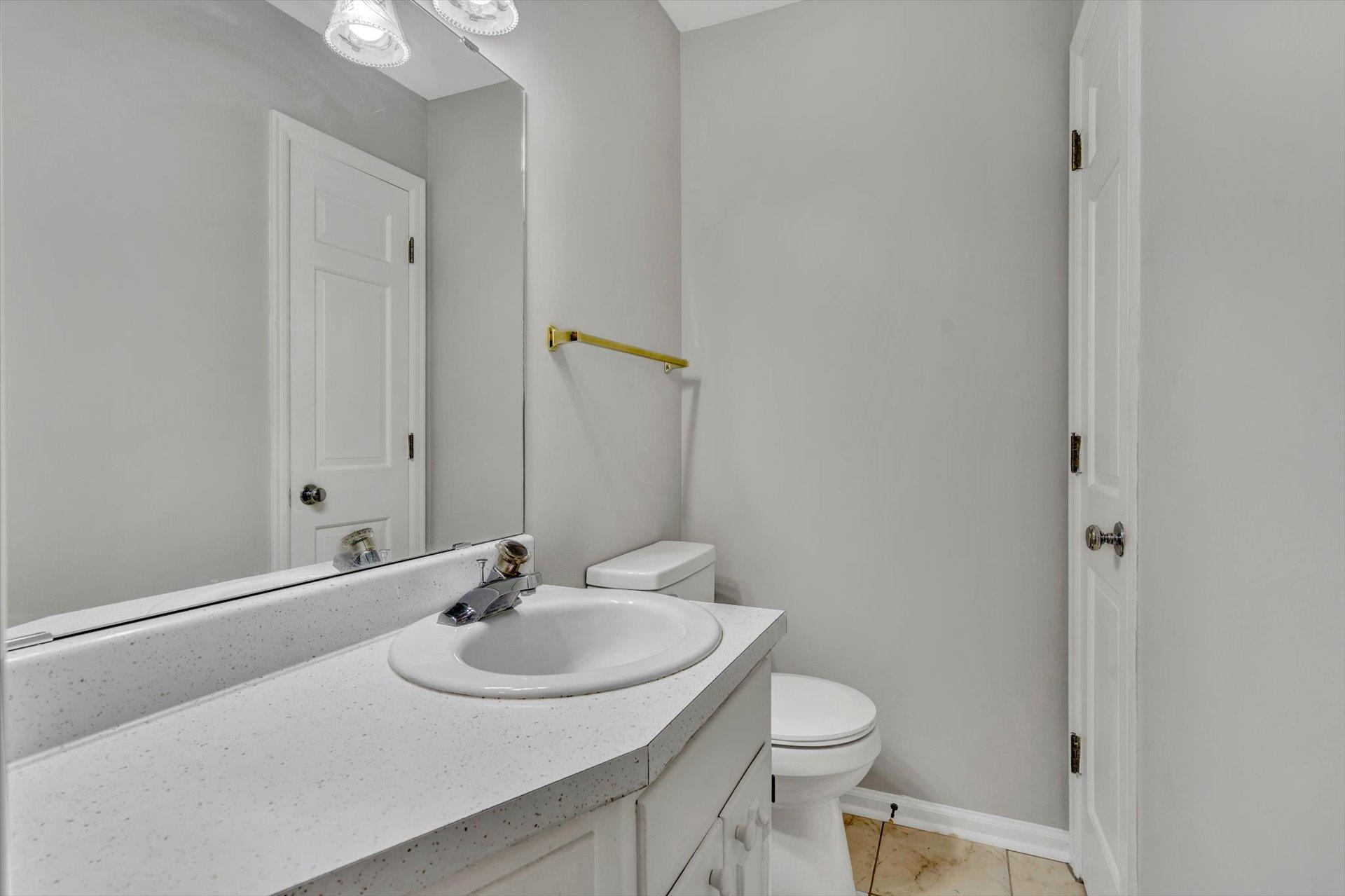 5157 Falcon Ridge Road Roanoke, VA 24018 - Photo 14 of 50 a bathroom with a sink and a mirror