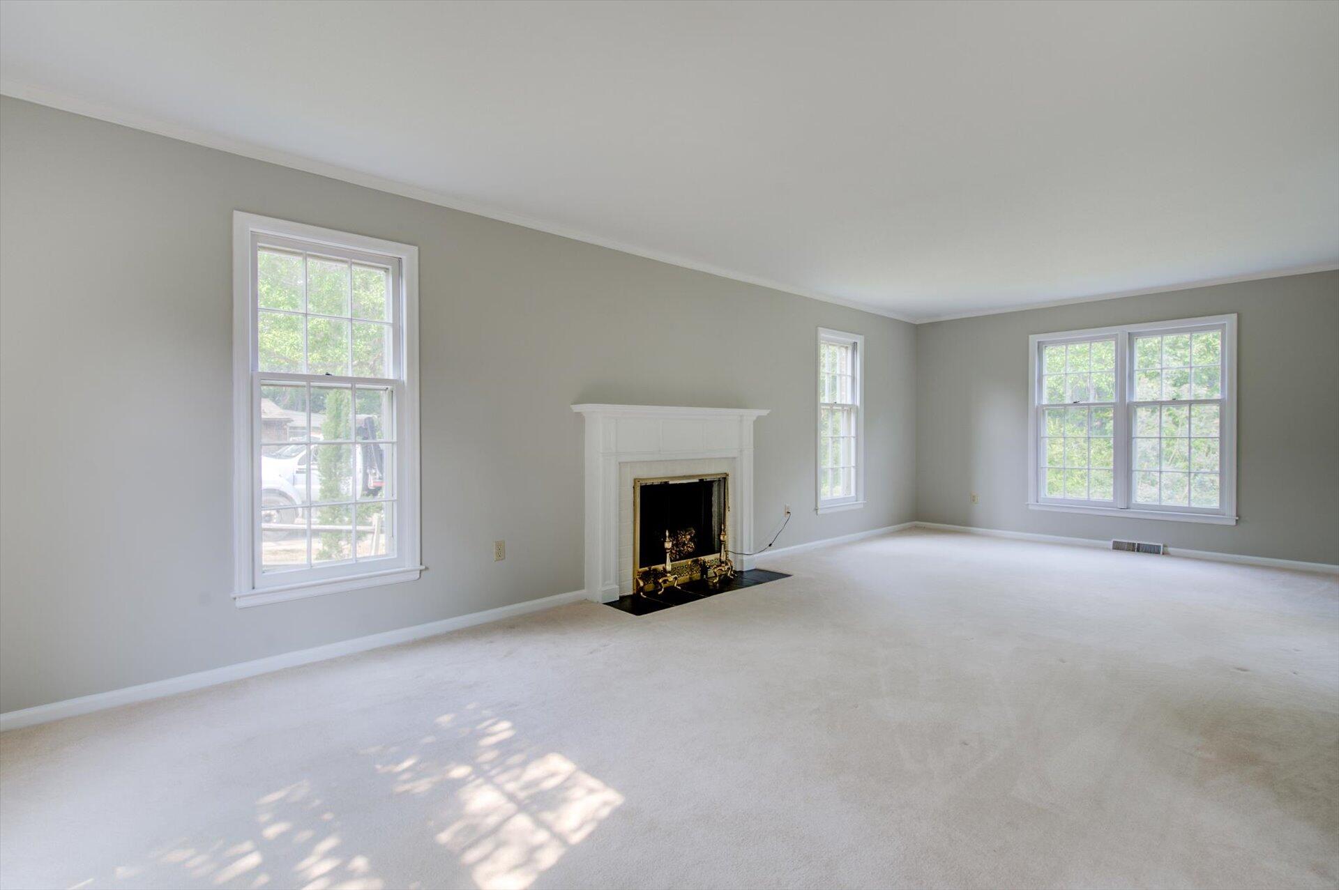 5157 Falcon Ridge Road Roanoke, VA 24018 - Photo 15 of 50 a view of a livingroom with a fireplace and window