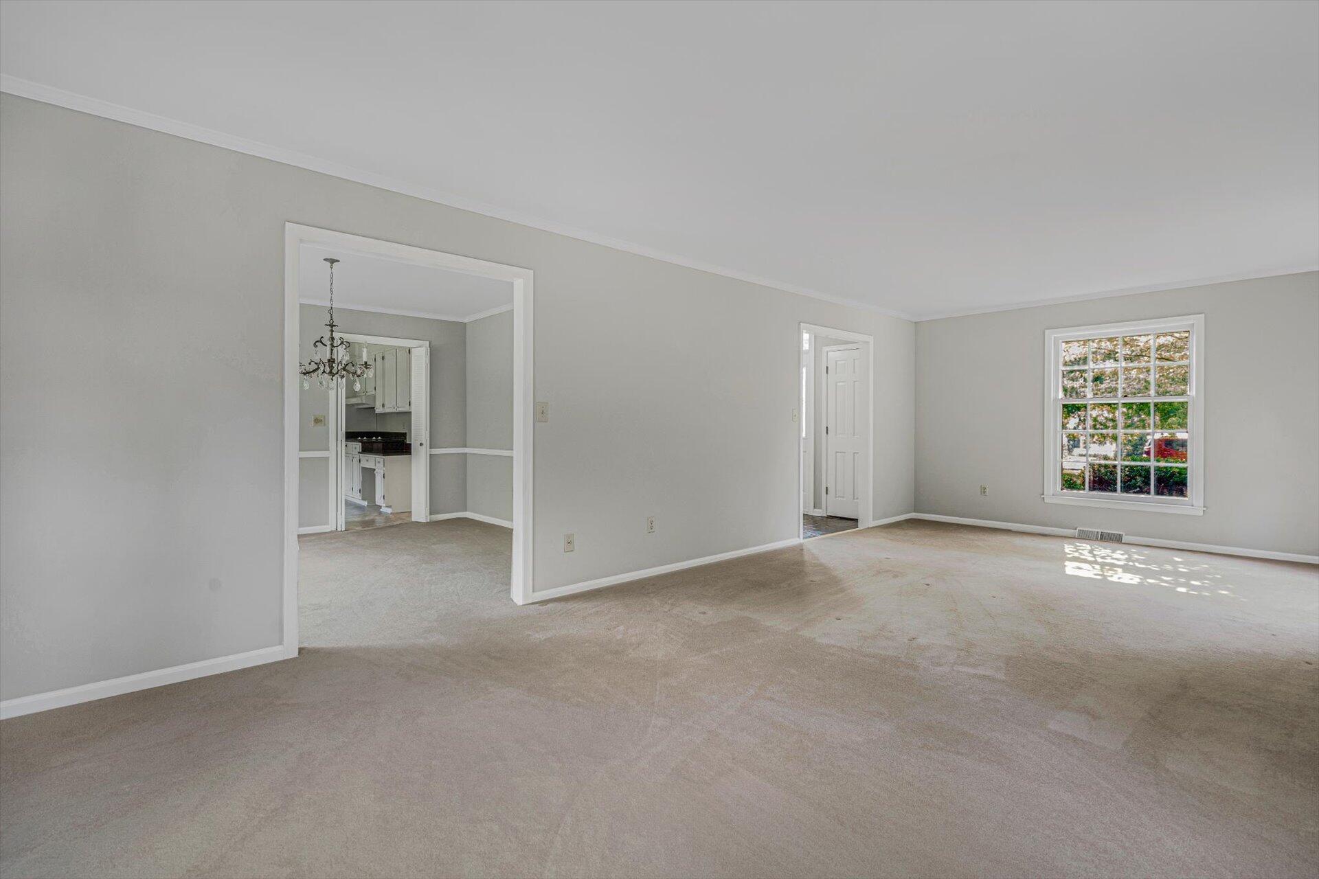 5157 Falcon Ridge Road Roanoke, VA 24018 - Photo 16 of 50 an empty room with windows and bathroom view