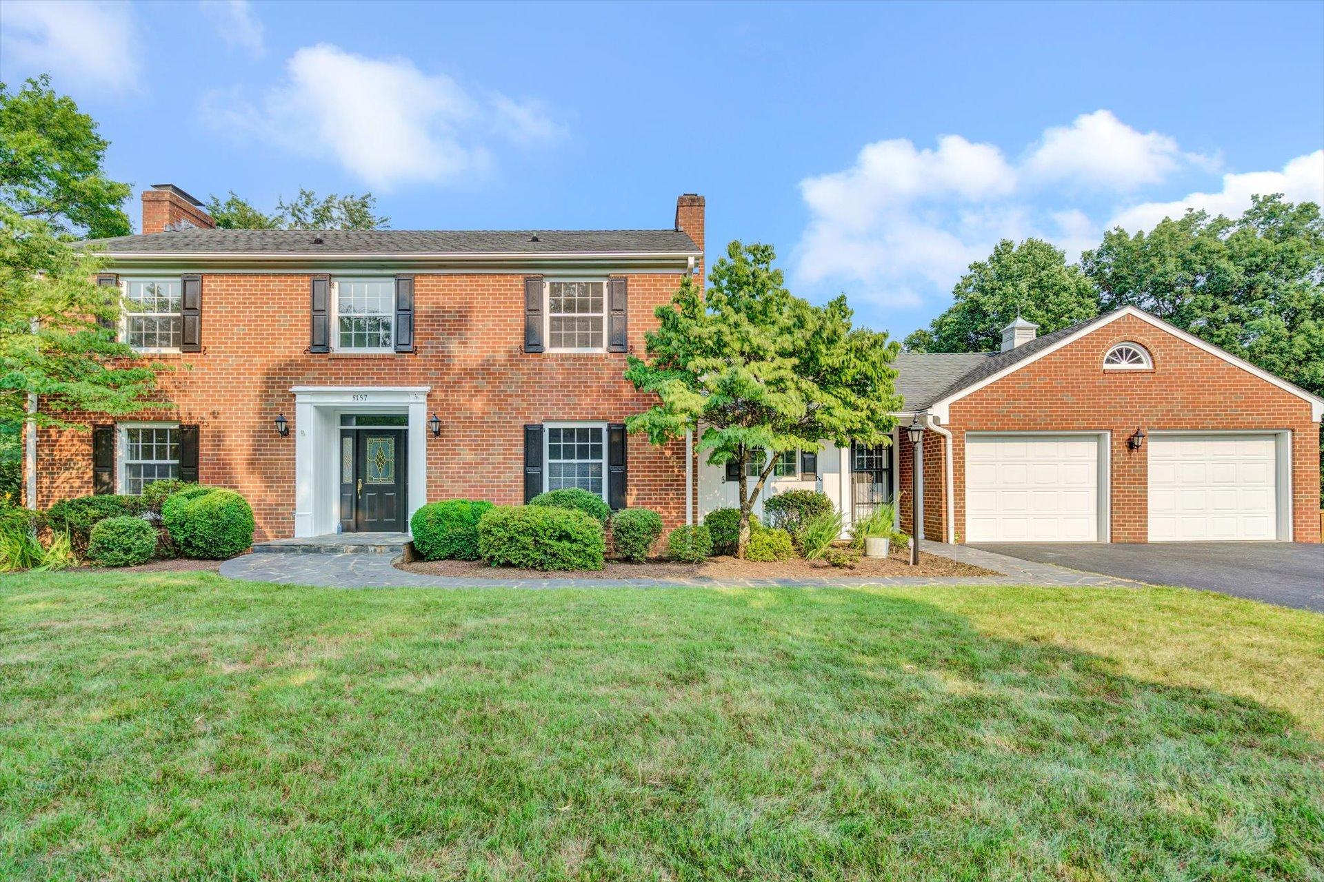 5157 Falcon Ridge Road Roanoke, VA 24018 - Photo 3 of 50 a front view of a house with a yard and garage