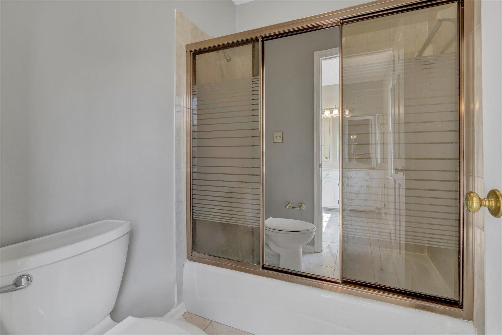 5157 Falcon Ridge Road Roanoke, VA 24018 - Photo 32 of 50 a bathroom with a shower and toilet