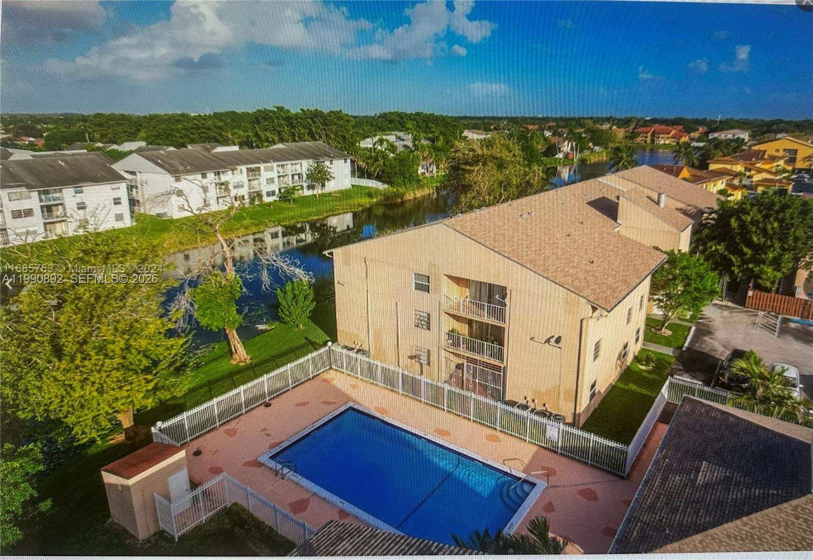 13810 Southwest 112th Street, Unit 106 Miami, FL 33186 - Photo 16 of 20 a view of a balcony with an outdoor space