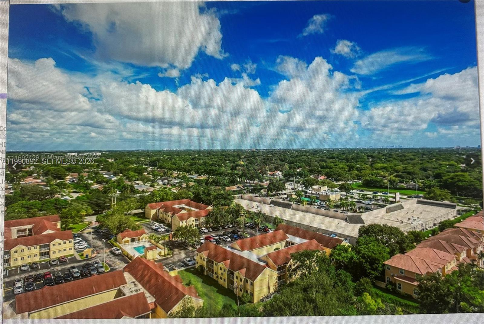 13810 Southwest 112th Street, Unit 106 Miami, FL 33186 - Photo 19 of 20 an aerial view of residential houses with outdoor space