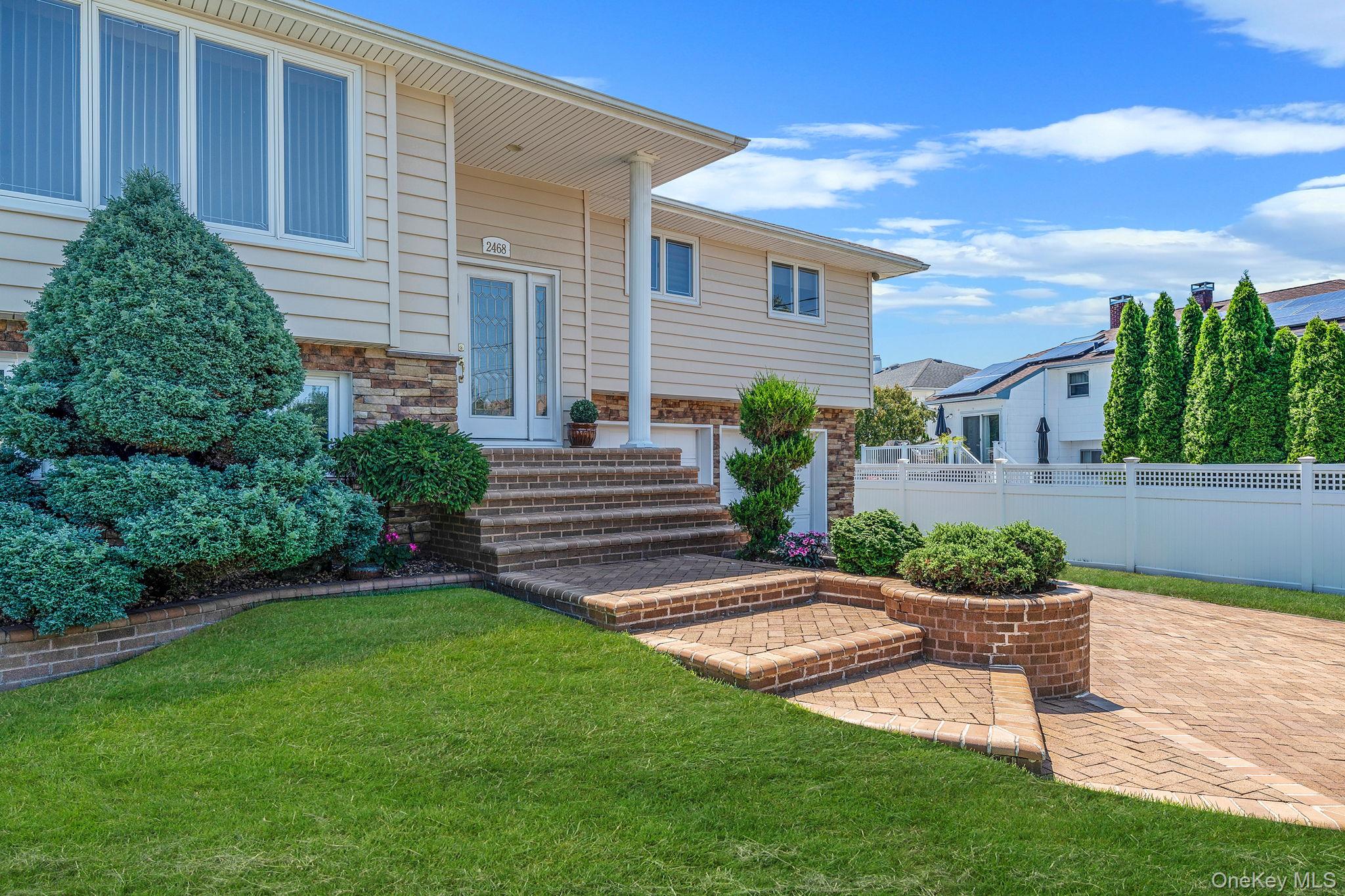 a view of a back yard of the house