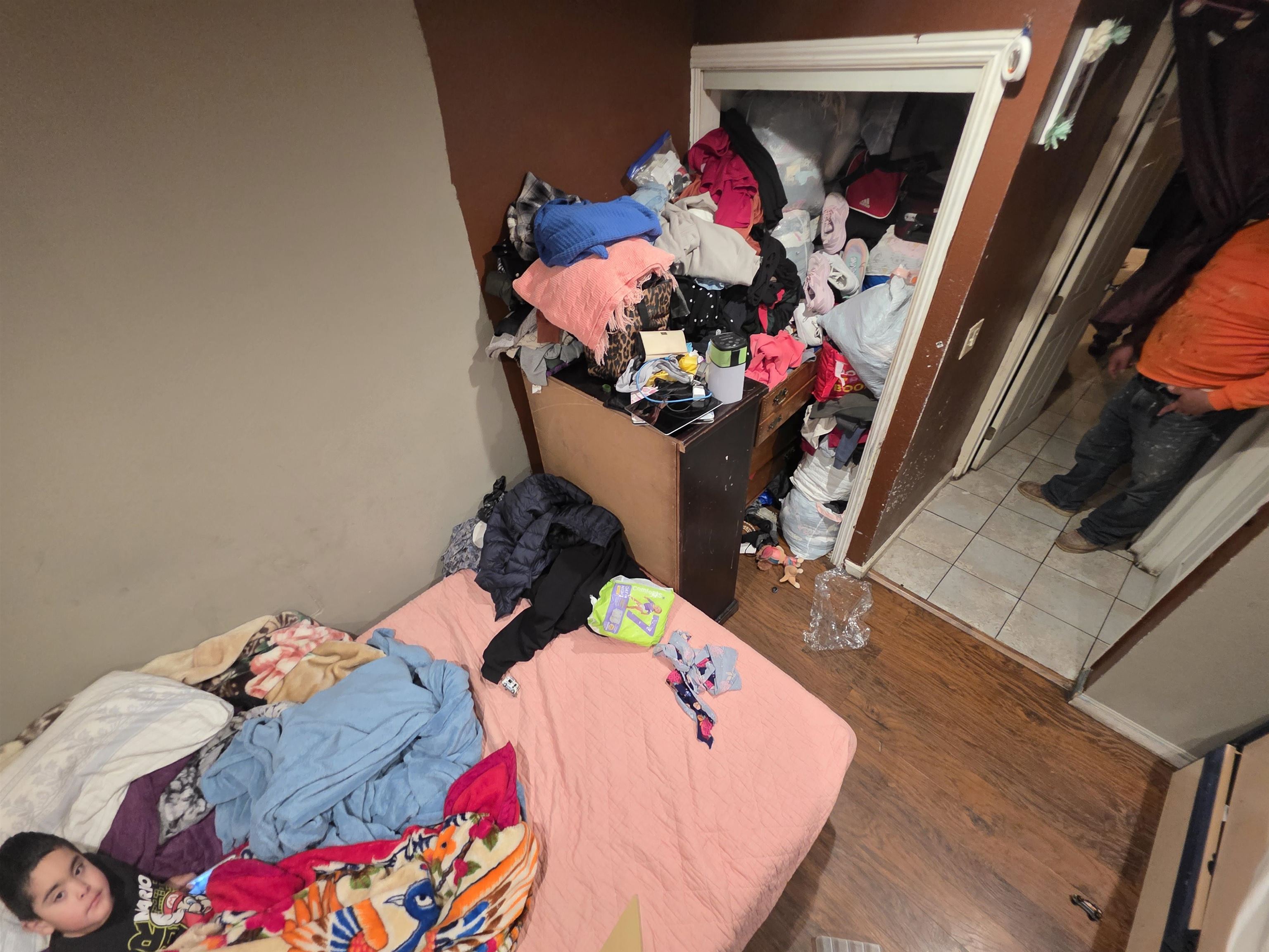 1823 Church Street Oakland, CA 94621 - Photo 8 of 18 Bedroom with wood finished floors and a closet