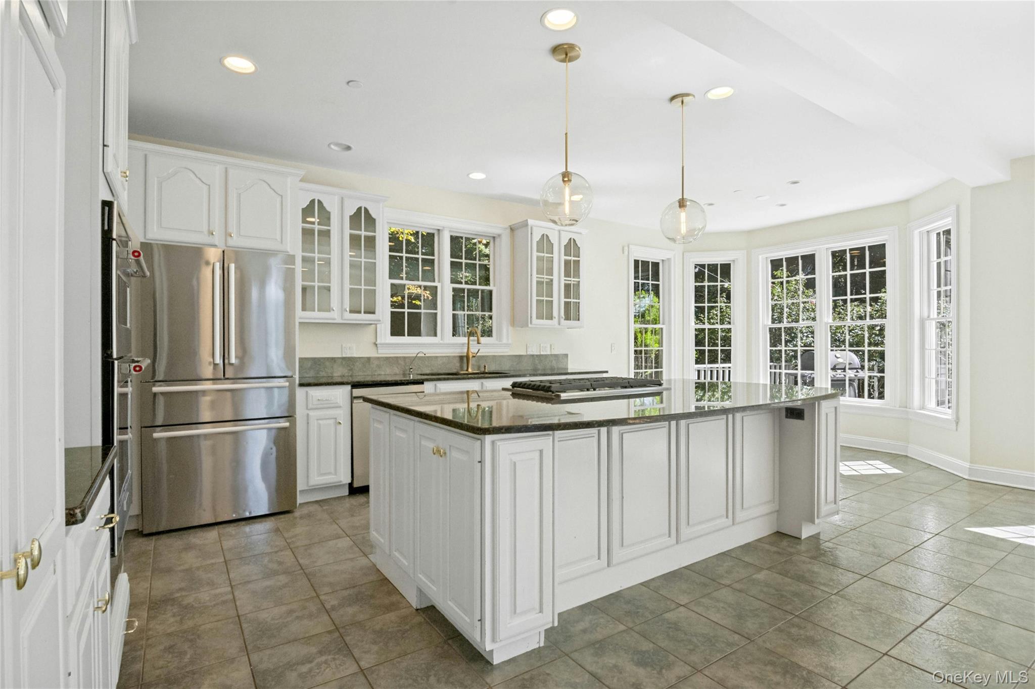 25 Riverview Road Irvington, NY 10533 - Photo 11 of 41 Stainless steel appliances, Laundry room on the first floor with a mudroom off the garage.