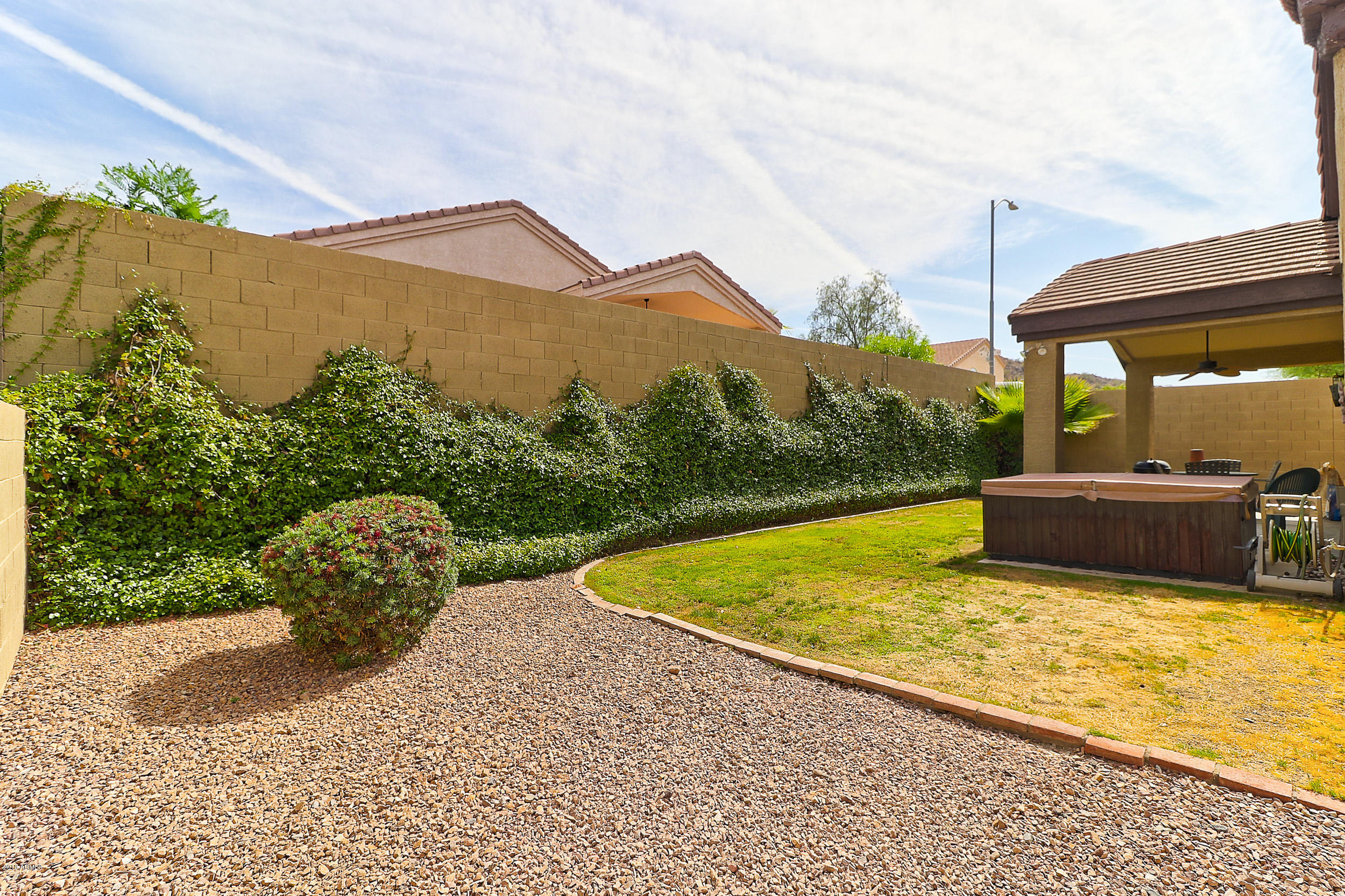 2101 East Escuda Road Phoenix, AZ 85024 - Photo 31 of 31 a view of a swimming pool with a yard