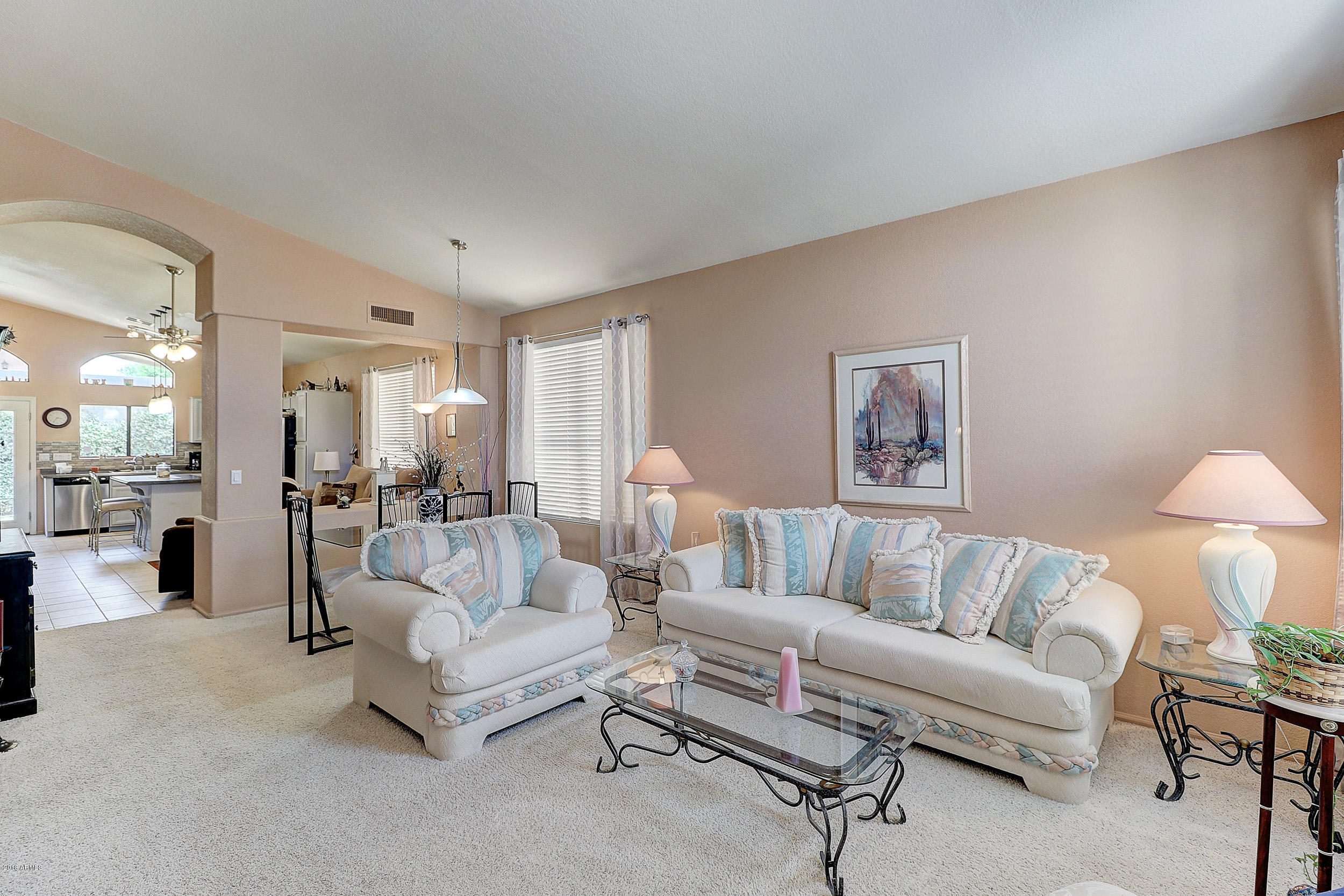 2101 East Escuda Road Phoenix, AZ 85024 - Photo 7 of 31 a living room with furniture and a table