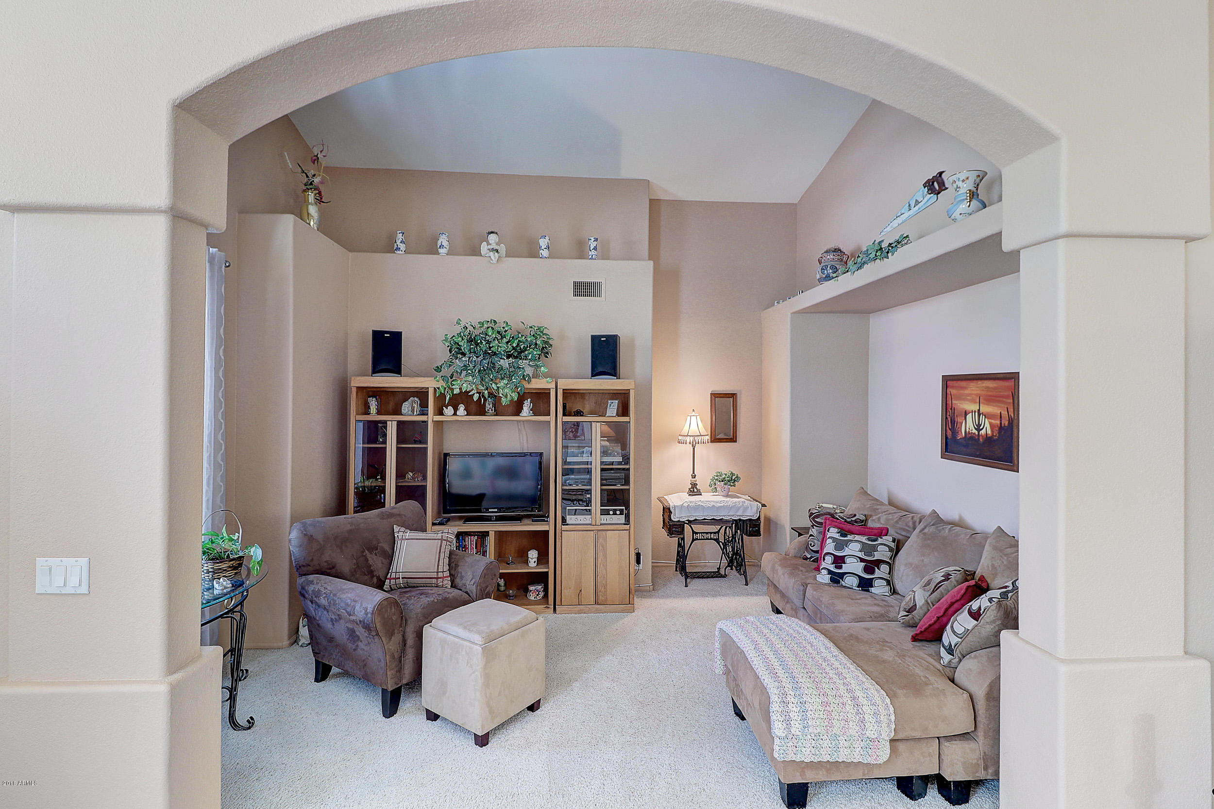 2101 East Escuda Road Phoenix, AZ 85024 - Photo 9 of 31 a living room with furniture and a window