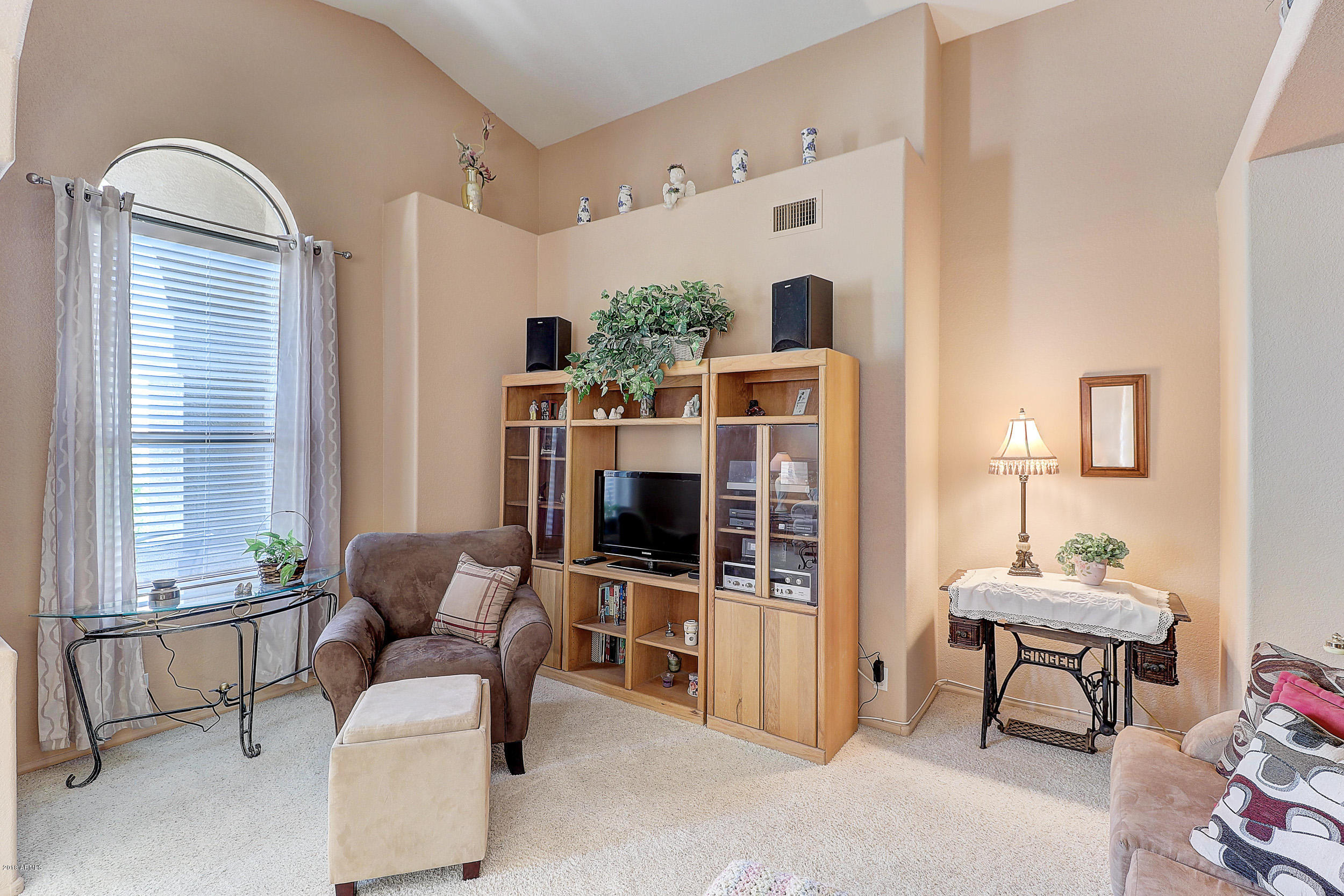 2101 East Escuda Road Phoenix, AZ 85024 - Photo 10 of 31 a living room with furniture and a window