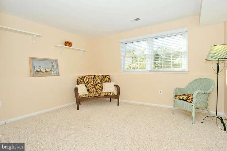 8901 Spur Road Springfield, VA 22153 - Photo 24 of 30 a living room with furniture and a window