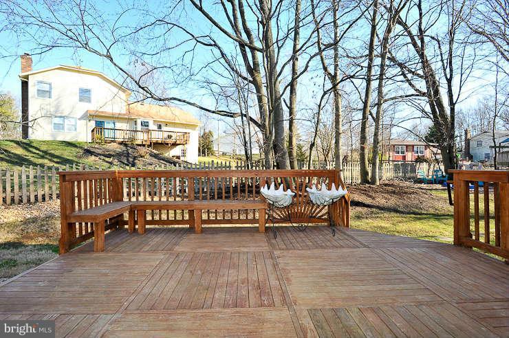 8901 Spur Road Springfield, VA 22153 - Photo 27 of 30 a view of a bench in the roof deck