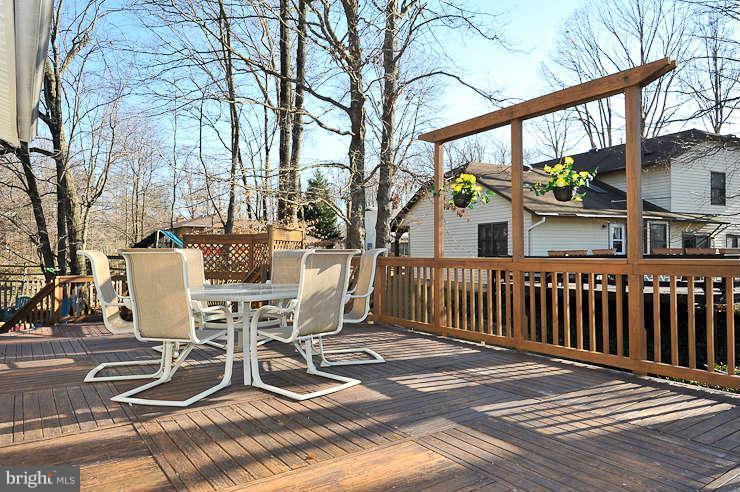 8901 Spur Road Springfield, VA 22153 - Photo 30 of 30 a view of a chair and tables in the patio