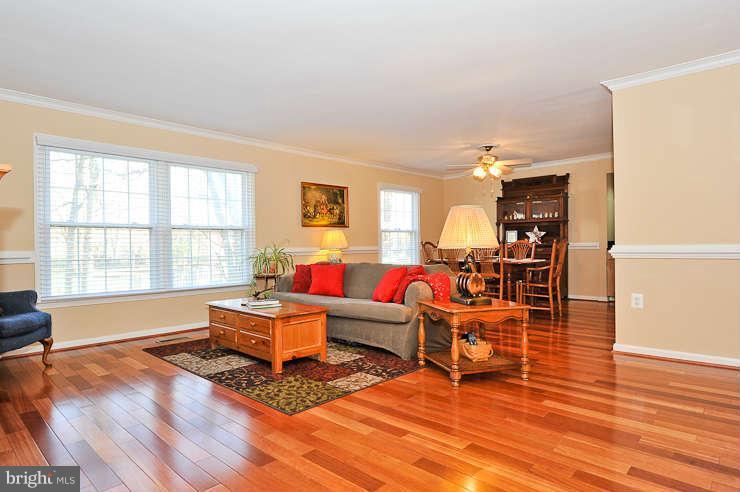 8901 Spur Road Springfield, VA 22153 - Photo 4 of 30 a living room with furniture window and wooden floor