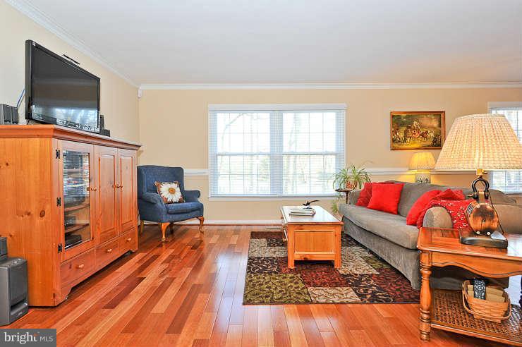8901 Spur Road Springfield, VA 22153 - Photo 5 of 30 a living room with furniture and a flat screen tv