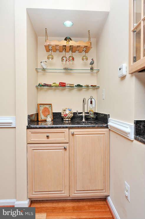 8901 Spur Road Springfield, VA 22153 - Photo 8 of 30 a kitchen with a cabinets and window