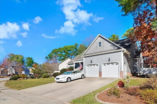 a view of a car in front of a house