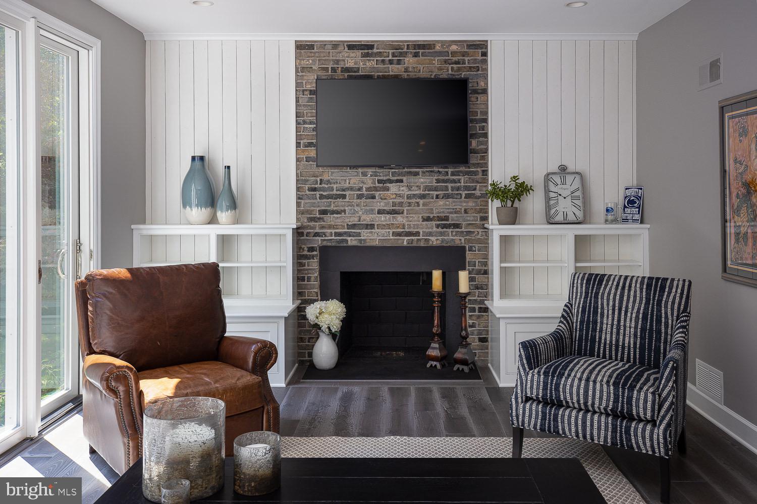 2 Chatham Place Wallingford, PA 19086 - Photo 14 of 37 Family room fireplace flanked by built-ins