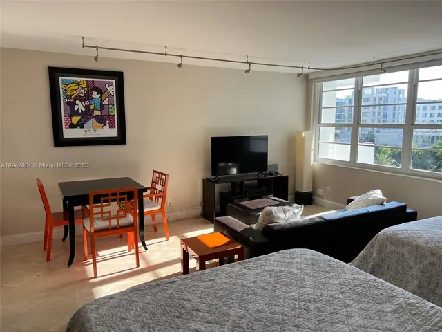 a bedroom with a bed and a closet