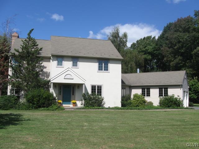 775 Texas Road Easton, PA 18042 - Photo 1 of 41 a front view of a house with a garden