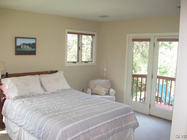 775 Texas Road Easton, PA 18042 - Photo 29 of 41 a bedroom with a large bed and a window