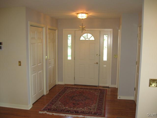 775 Texas Road Easton, PA 18042 - Photo 6 of 41 a view of a livingroom with wooden floor and cabinet
