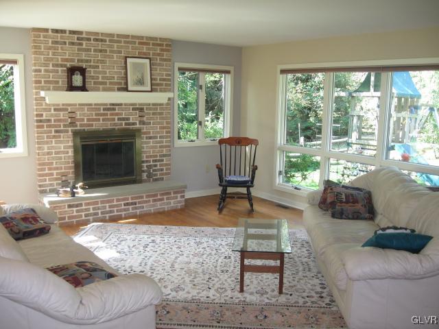 775 Texas Road Easton, PA 18042 - Photo 7 of 41 a living room with furniture and a fireplace