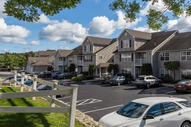 a view of a street with cars
