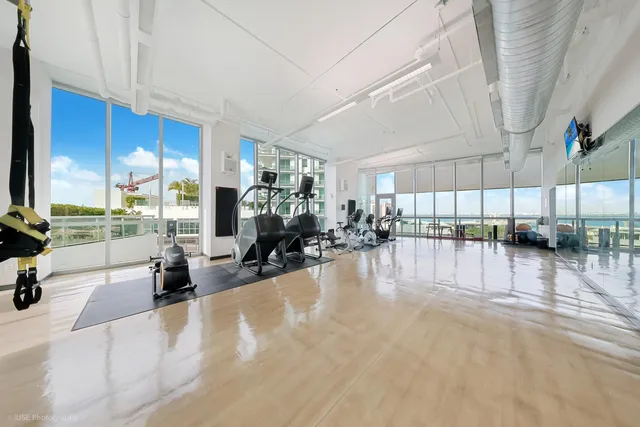 a view of a living room and kitchen